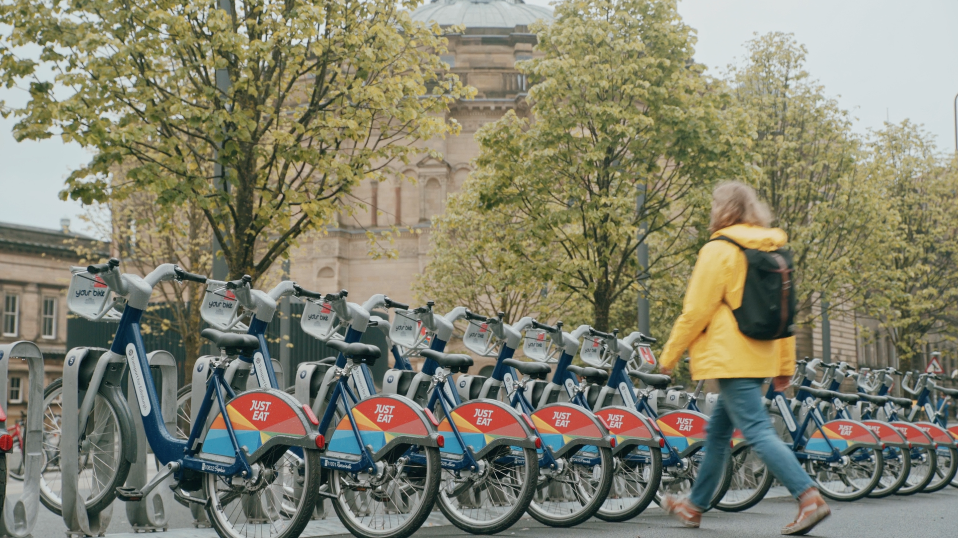 Just Eat Bikes lined up on side of street